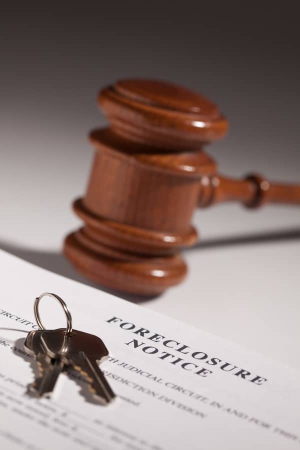 Foreclosure notice on front door of home – Meadowlark Strategic Solutions helps homeowners sell fast
